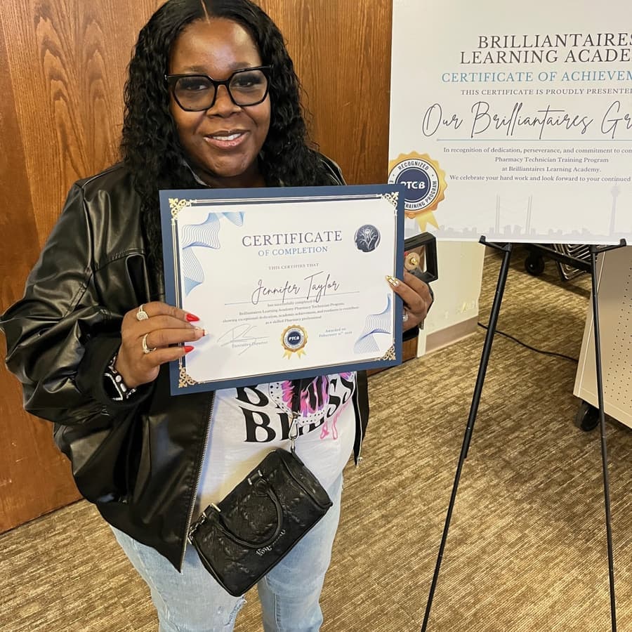 A Brilliantaires graduate on certification day